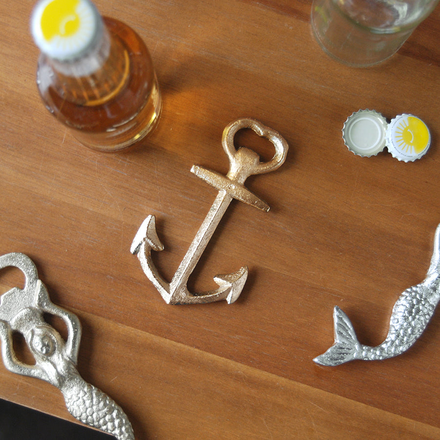 Gold anchor bottle opener with a luxe nautical feel. Durable, decorative, and perfect for bar carts, picnics, and coastal-inspired home styling.