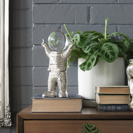 Modern silver astronaut ornament with reflective glass helmet