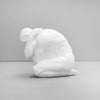 Minimalist human form sculpture used as modern home decor accent