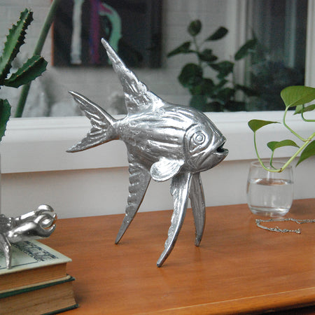 Decorative silver fish ornament with tall textured fins