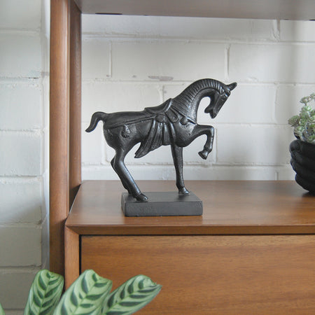 Decorative black horse ornament with sculpted detailing