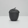 Intericately detailed resin acorn storage box with secret lid. Beautiful designer home decor acorn for interior design and styling