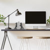Sculptural black gorilla bookends styled in modern interior