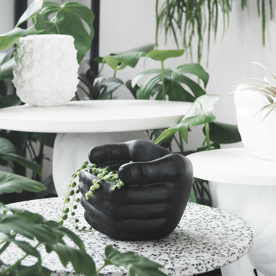 hand shaped plant pot Black Hand Planter – Sculptural Resin Pot by White Moose