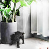 Unique dog statue for playful interiors